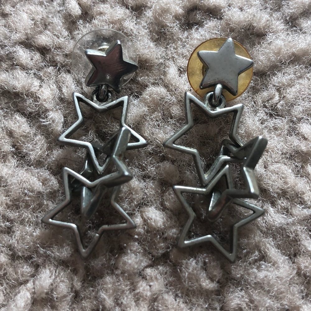 Silver dangle connected stars pierced earrings